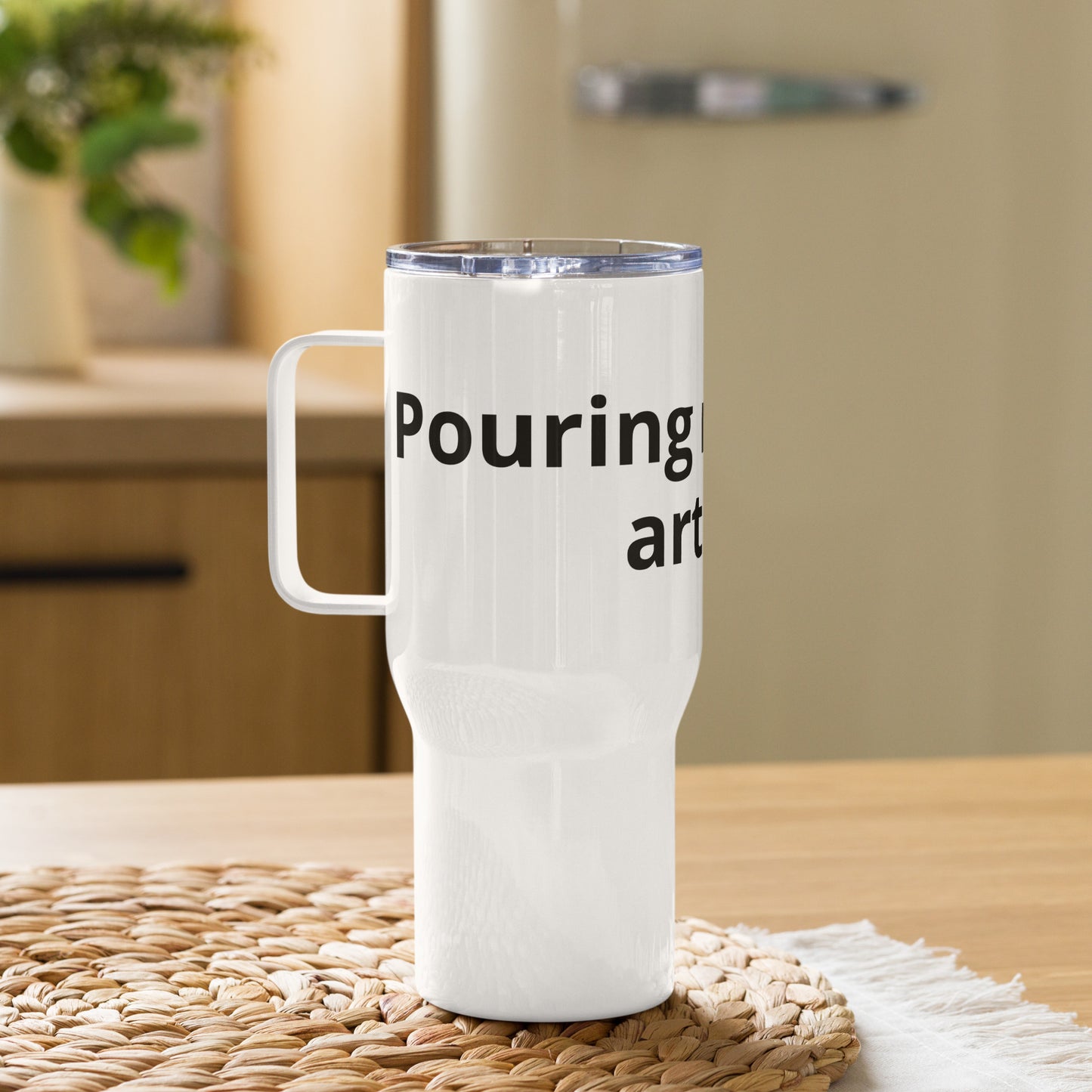 Travel mug with a handle